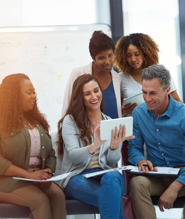 Group collaborating over a tablet